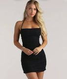 Feel confident and photo-ready in the Under My Spell Glitter Halter Mini Dress, a black graduation dress perfect for 2025 ceremonies and parties.
