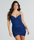 Step into winter chic with the Dazzle Day To Night Glitter Mini Dress, a navy mini dress featuring an above-the-knee cut ideal for cocktail parties, festive gatherings, or clubwear.