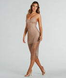The midi dress length on the Caught In Good Vibes Fishnet Rhinestone Midi Dress provides an elevated silhouette perfect for any party, occasion, or everyday styling.