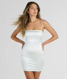 The Contemporary Charm Faux Pearl Rhinestone Satin Mini Dress is a mini dress that will make a statement with its short hemline and on-trend details to have you ready for any event!