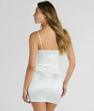 The Contemporary Charm Faux Pearl Rhinestone Satin Mini Dress is a mini dress that will make a statement with its short hemline and on-trend details to have you ready for any event!