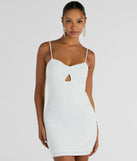 The Glitzy Shine Twist-Front Glitter Mini Dress is a mini dress that will make a statement with its short hemline and on-trend details to have you ready for any event!