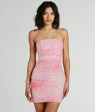 Turn heads in the beaming Enchanting Muse Iridescent Sequin Mini Dress, a stunning pink sequin dress designed to add sparkle and elegance to your next night out or special occasion.