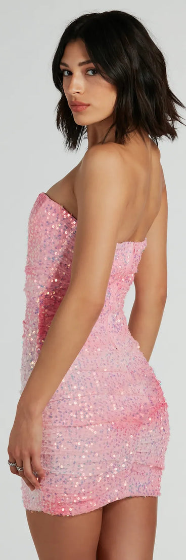 The Enchanting Muse Iridescent Sequin Mini Dress is a mini dress that will make a statement with its short hemline and on-trend details to have you ready for any event!