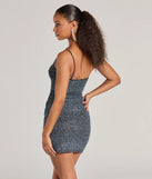 Revamp your 2025 wardrobe with this chic addition, the Amp Up The Glitz Glitter Knit Mini Dress in black, perfect for elevating your style in the new year.
