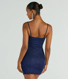 Bring high-impact style to your nightlife in the Key To Sparkle Glitter Mini Dress, a bold navy blue club dress made for dancing, parties, and unforgettable nights.