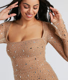 Shine with confidence, elegance, and standout style in the Dazzling Glam Long Sleeve Rhinestone Mesh Mini Dress—a nude graduation dress designed with a fresh silhouette and the latest trends.