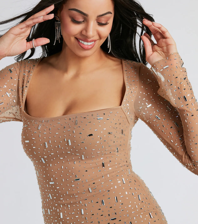 Shine with confidence, elegance, and standout style in the Dazzling Glam Long Sleeve Rhinestone Mesh Mini Dress—a nude graduation dress designed with a fresh silhouette and the latest trends.
