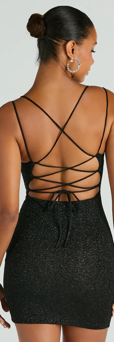 The Lace Me Up Glitter Mini Dress is a black holiday dress with a festive style, crafted from luxe fabrics and with unique design accents, a perfect pick as your holiday party dress.