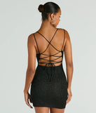 The Lace Me Up Glitter Mini Dress is a black holiday dress with a festive style, crafted from luxe fabrics and with unique design accents, a perfect pick as your holiday party dress.