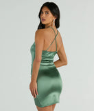 Flaunt your silhouette in the tight Luxe Guaranteed Satin Bodycon Mini Dress in sage green, a bodycon dress that empowers your look with bold style and effortless edge.
