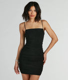 Step into seasonal chic with the Extra Chic Pearl Ruched Mesh Mini Dress, a black mini dress featuring an above-the-knee cut ideal for cocktail parties, festive gatherings, or clubwear.