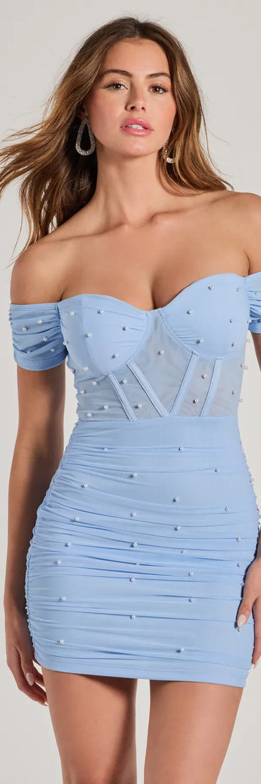 The Flirty Luxe Off-The-Shoulder Faux Pearl Mini Dress is a mini dress that will make a statement with its short hemline and on-trend details to have you ready for any event!