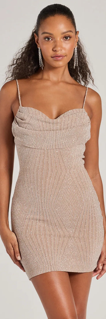 Step into seasonal chic with the Glitzy Allure Glitter Strappy Back Mini Dress, a raisin purple mini dress featuring an above-the-knee cut ideal for cocktail parties, festive gatherings, or clubwear.