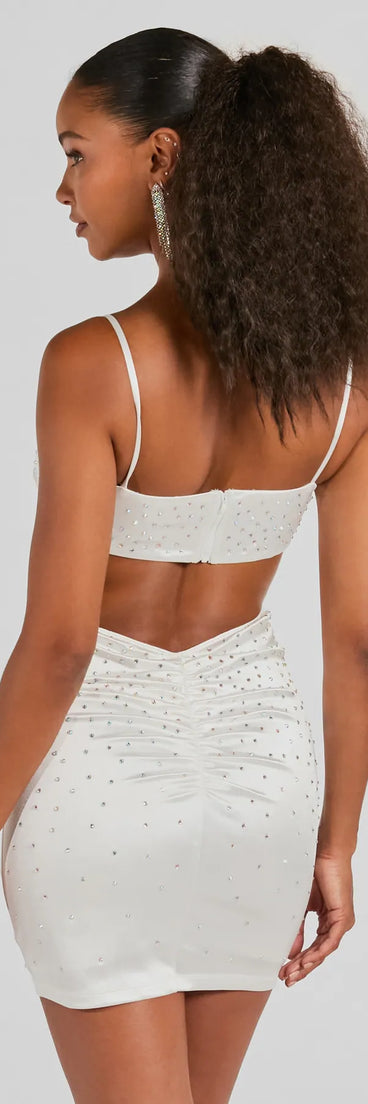 Revamp your 2025 wardrobe with this chic addition, the Shine Bright Babe V-Neck Rhinestone Satin Mini Dress in white, perfect for elevating your style in the new year.