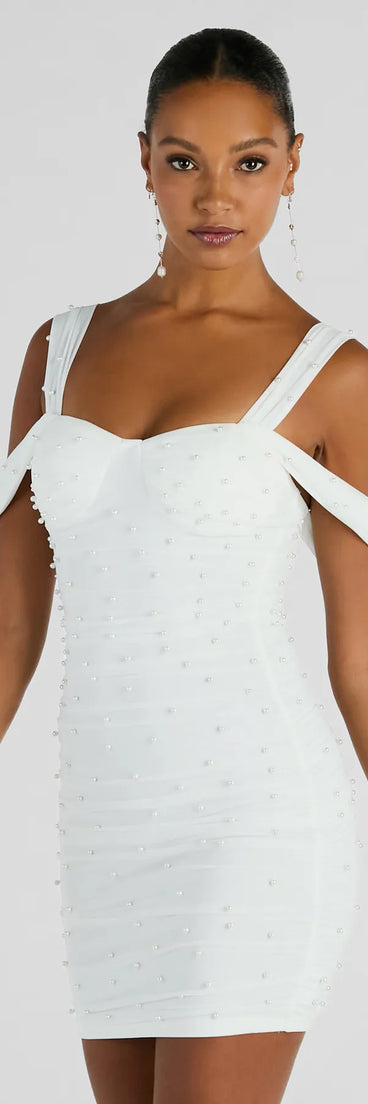 Shine with confidence, elegance, and standout style in the Breathtaking Impression Faux Pearl Bodycon Mini Dress—a white homecoming dress designed with a fresh silhouette and the latest trends.