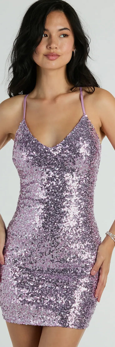Turn heads in the beaming She's The Gift Strappy Back Sequin Party Dress, a stunning lavender sequin dress designed to add sparkle and elegance to your next night out or special occasion.