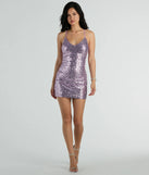The She's The Gift Strappy Back Sequin Party Dress is a dazzling lavender sequin dress, perfect for making a bold entrance at any event, from cocktail parties to formal celebrations.