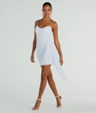 Step into seasonal chic with the Strut Around Glitter Mesh Mini Dress With Sash, a white mini dress featuring an above-the-knee cut ideal for cocktail parties, festive gatherings, or clubwear.