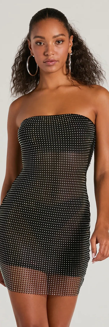 Level up your club dress with the Dancing Babe Strapless Rhinestone Fishnet Mini Dress to create a trendy Vegas outfit or nightclub dress with the hottest details!