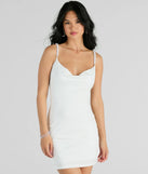 Step into winter chic with the Reason To Celebrate Faux Pearl Strap Mini Dress, a white mini dress featuring an above-the-knee cut ideal for cocktail parties, festive gatherings, or clubwear.