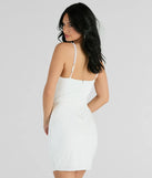 The Reason To Celebrate Faux Pearl Strap Mini Dress is a mini dress in white, perfect for an above-the-knee holiday party dress or a stylish NYE look, with a short hemline designed to make a winter statement.