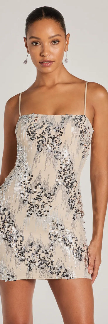 Turn heads in the beaming Sparkly Desire Bodycon Sequin Mini Dress, a stunning natural sequin dress designed to add sparkle and elegance to your next night out or special occasion.