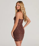 Turn heads with the Dazzle Babe Rhinestone Strapless Bodycon Mini Dress, a brown New Year's Eve dress featuring a festive style and glamorous accents, ideal for any NYE celebration or cocktail party.