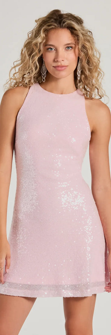 Turn heads in the beaming Make A Statement Tulle Bow A-Line Sequin Mini Dress, a stunning white sequin dress designed to add sparkle and elegance to your next night out or special occasion.