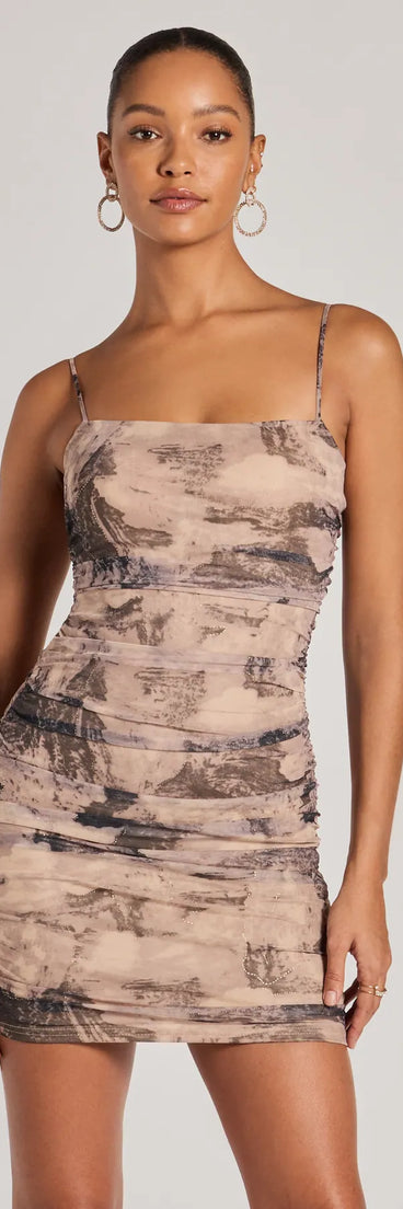 Step into seasonal chic with the Ever So Alluring Lace-Up Abstract Mini Dress, a taupe mini dress featuring an above-the-knee cut ideal for cocktail parties, festive gatherings, or clubwear.