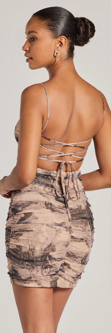 Revamp your 2025 wardrobe with this chic addition, the Ever So Alluring Lace-Up Abstract Mini Dress in taupe, perfect for elevating your style in the new year.