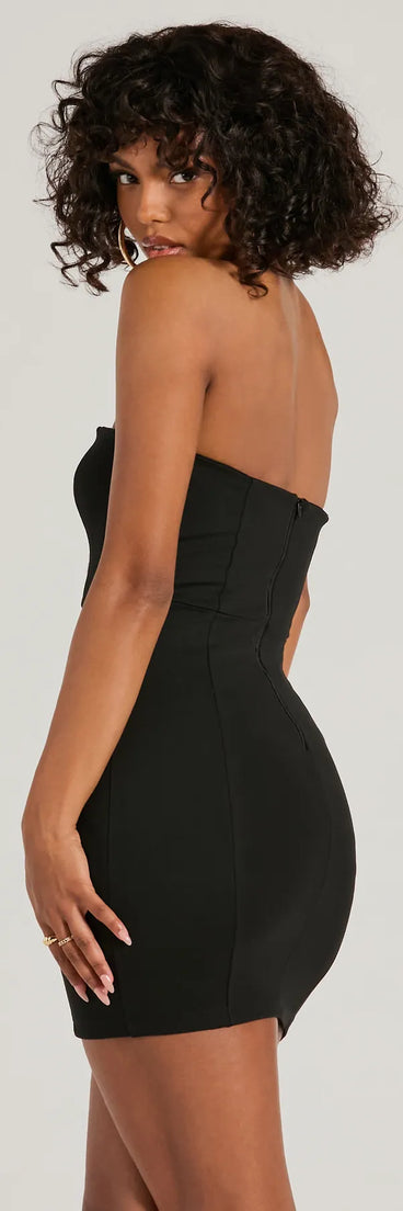 The Perfectly Polished Strapless Bow Ponte Mini Dress is a mini dress in black, perfect for an above-the-knee holiday party dress or a stylish NYE look, with a short hemline designed to make a winter statement.