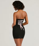 Flaunt your silhouette in the tight Irresistible Confidence Lace-Up Ponte Mini Dress in black, a bodycon dress that empowers your look with bold style and effortless edge.