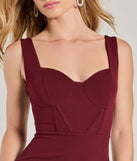 Step into seasonal chic with the Sultry Stunner Crepe Corset Mini Dress, a burgundy mini dress featuring an above-the-knee cut ideal for cocktail parties, festive gatherings, or clubwear.