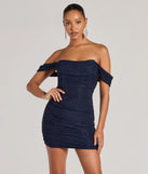 Step into winter chic with the Glimmer Babe Glitter Off-The-Shoulder Mini Dress, a raisin purple mini dress featuring an above-the-knee cut ideal for cocktail parties, festive gatherings, or clubwear.
