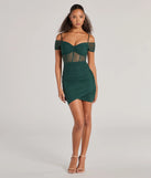 Make a bold statement in the Elegant Existence Cold Shoulder Mesh Mini Dress in hunter green, the perfect green dress for weddings, cocktail hours, nights out, and/or seasonal celebrations.