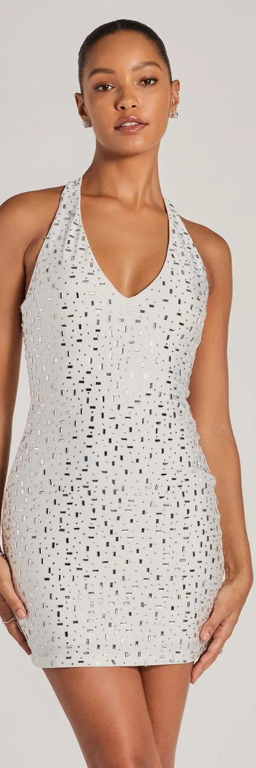 The Forever Sparkling V-Neck Halter Rhinestone Mini Dress is a mini dress that will make a statement with its short hemline and on-trend details to have you ready for any event!