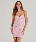Step into seasonal chic with the Decadent Beauty Bustier Floral Sequin Mini Dress, a pink mini dress featuring an above-the-knee cut ideal for cocktail parties, festive gatherings, or clubwear.