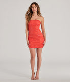 The Party Starter Sequin Lace Strapless Mini Dress is a dazzling orange sequin dress, perfect for making a bold entrance at any event, from cocktail parties to formal celebrations.