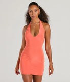 The Sultry Moves Plunging Halter Bodycon Mini Dress is a mini dress that will make a statement with its short hemline and on-trend details to have you ready for any event!