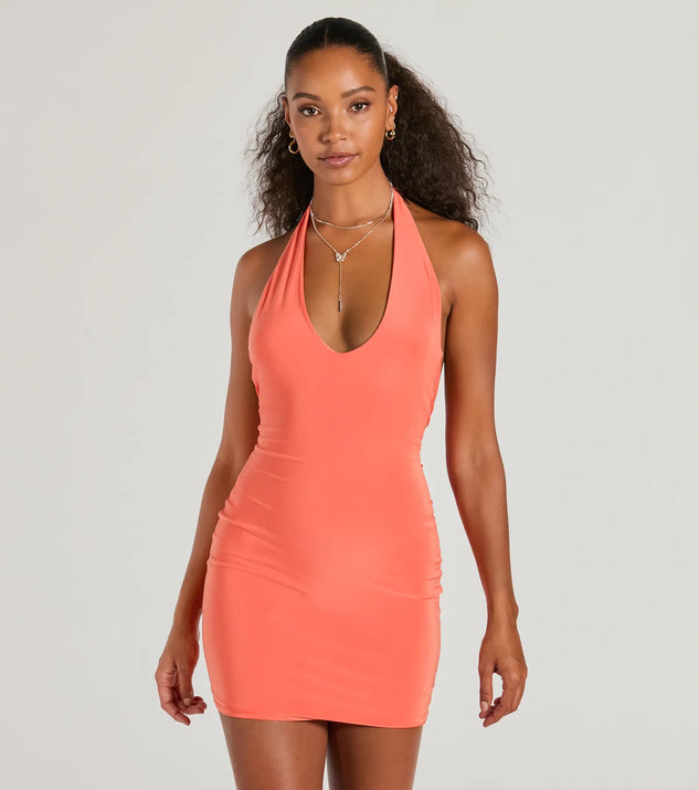The Sultry Moves Plunging Halter Bodycon Mini Dress is a mini dress that will make a statement with its short hemline and on-trend details to have you ready for any event!