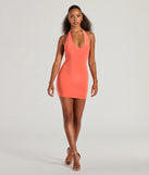 Step into seasonal chic with the Sultry Moves Plunging Halter Bodycon Mini Dress, a orange mini dress featuring an above-the-knee cut ideal for cocktail parties, festive gatherings, or clubwear.