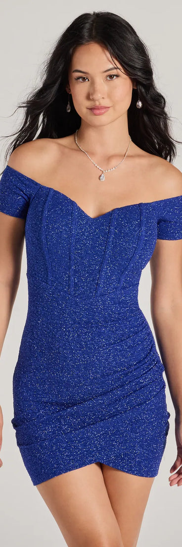 Step into winter chic with the Dazzling Bright Off-The-Shoulder Glitter Mini Dress, a royal mini dress featuring an above-the-knee cut ideal for cocktail parties, festive gatherings, or clubwear.