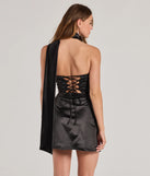 Turn heads with the On The Guest List Strapless Lace-Up Satin Mini Dress, a black New Year's Eve dress featuring a festive style and glamorous accents, ideal for any NYE celebration or cocktail party.