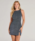 Step into seasonal chic with the Spotlight Glam Open Back Glitter Mini Dress, a black mini dress featuring an above-the-knee cut ideal for cocktail parties, festive gatherings, or clubwear.