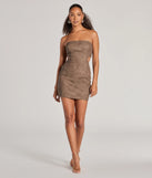 The Iconic Allure Faux Leather Strapless Bodycon Mini Dress is a stunning sea foam mini dress with a short hem, designed to be the perfect winter cocktail dress or night-out look for the holiday season.