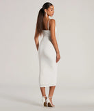 The Treat Yourself Sleeveless Bow Cutout Midi Dress in white combines chic design and festive charm, offering a cocktail dress perfect for winter cocktail parties, work events, and holiday soirées.
