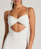 Elevate your winter wardrobe with the Treat Yourself Sleeveless Bow Cutout Midi Dress— a party-ready white cocktail dress featuring seasonal accents and a sophisticated style, ideal for semi-formal holiday events from family dinners to NYE celebrations.