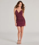 Make a bold statement in the Loaded With Glam Halter Rhinestone Mesh Mini Dress in wine, the perfect summer dress for weddings, cocktail hours, nights out, and/or seasonal celebrations.