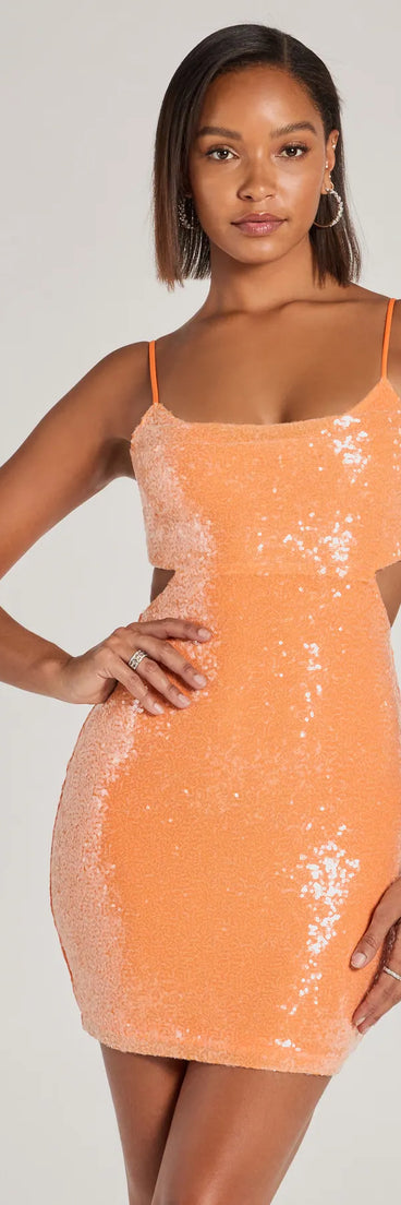 Turn heads in the beaming Sparkle Approach Cutout Bodycon Sequin Mini Dress, a stunning orange sequin dress designed to add sparkle and elegance to your next night out or special occasion.